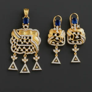 Gold-plated designer CZ filigree pendant set with blue stone accents and geometric dangle drops displayed on hand – Risha Fine Jewels.