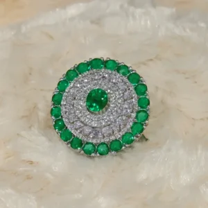 Premium emerald-green stone halo cocktail ring with double CZ halo and silver-plated finish by Risha Fine Jewels.