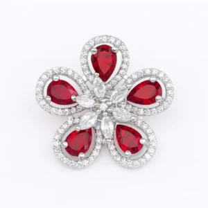 Radiant Ruby Red CZ Flower Ring for Women – White-Gold Finished Designer Ring Featuring Pear-Cut Ruby Stones and Marquise CZ Petals in a Floral Statement Design by Risha Fine Jewels.