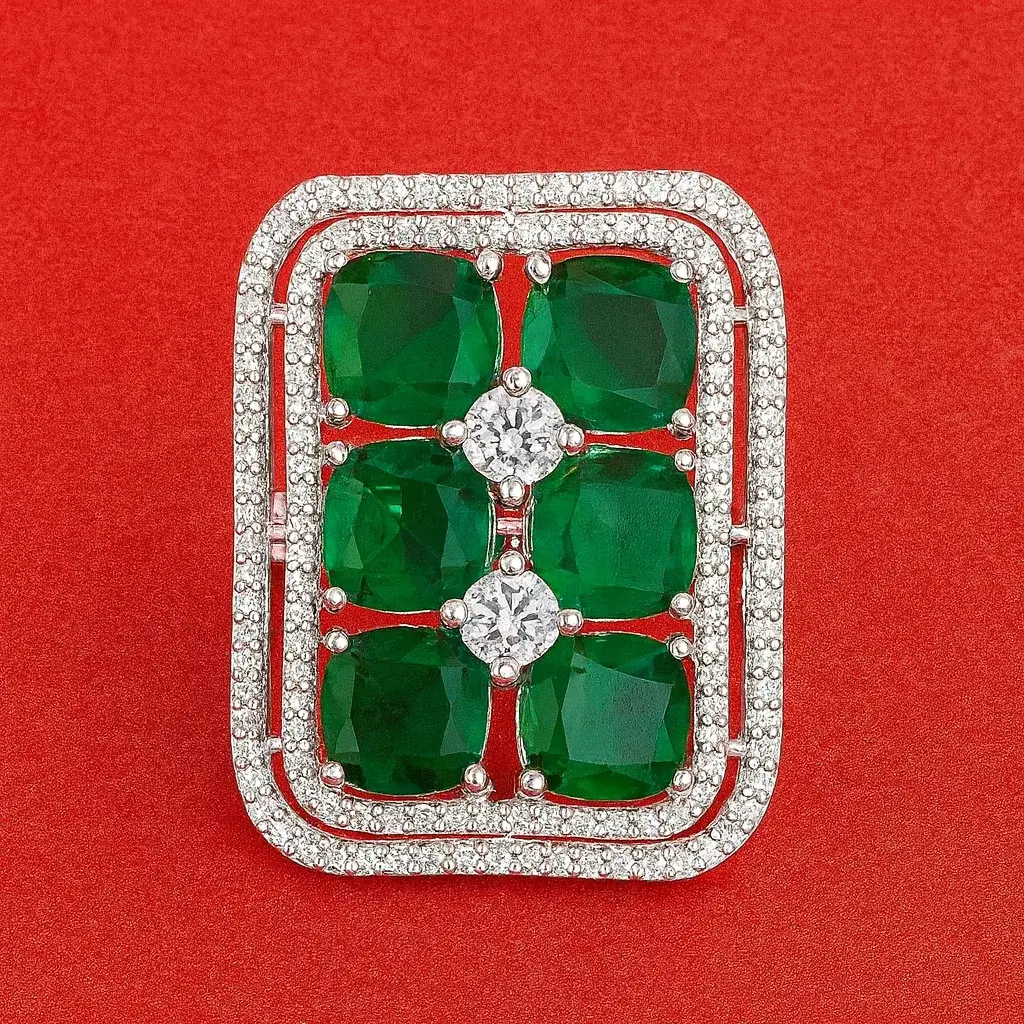 Vintage-Style Emerald Green Grid Ring with CZ Halo Vintage-Style Emerald Green Grid Ring for Women – White-Gold Finished Statement Ring Featuring Cushion-Cut Emerald CZ Stones and Sparkling CZ Halo Detailing by Risha Fine Jewels.