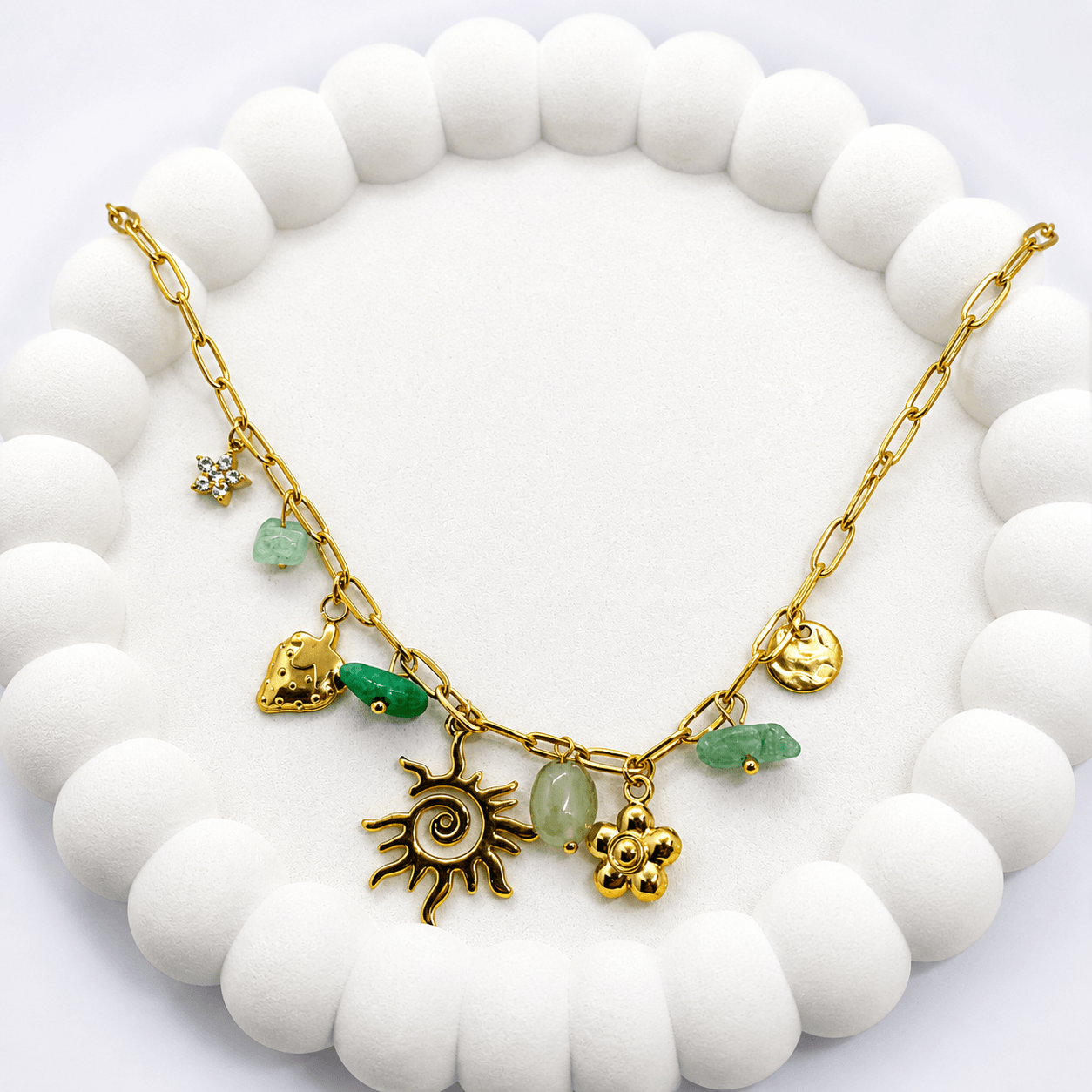 Risha Fine Jewels Gold-Toned Charm Necklace with Green Stone Accents | Trendy Artificial Jewelry for Women